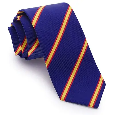 Corbata azul con rayas de la bandera de España | Corbata hecha a mano y fabricada en España | Corbata original presentada en un estuche